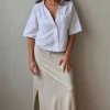 Falda larga de algodón con aberturas laterales beige