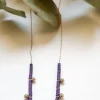 Gargantilla de acero con estrellas y piedras de colores violetas