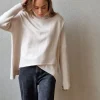 Jersey cuello alto cruzado beige