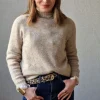 Jersey cuello alto jaspeado beige