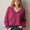 Jersey cuello pico con pespunte magenta