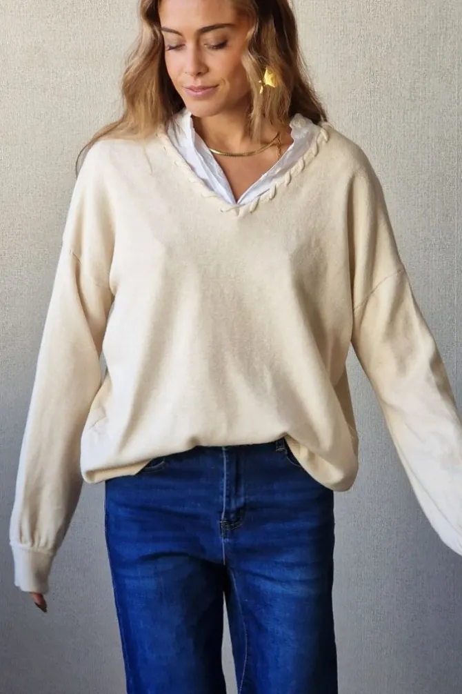 Jersey cuello pico con pespunte crudo