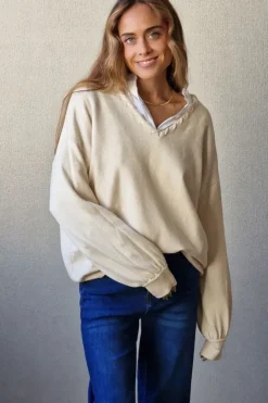 Jersey cuello pico con pespunte crudo
