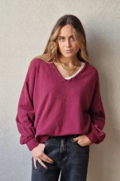Jersey cuello pico con pespunte magenta