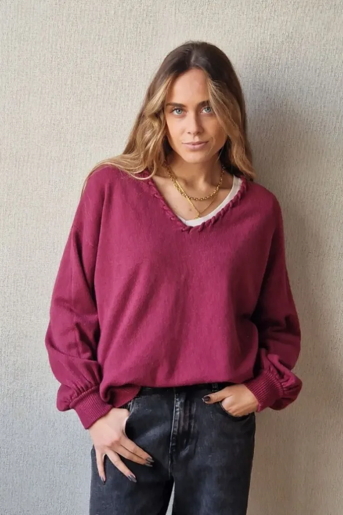 Jersey cuello pico con pespunte magenta