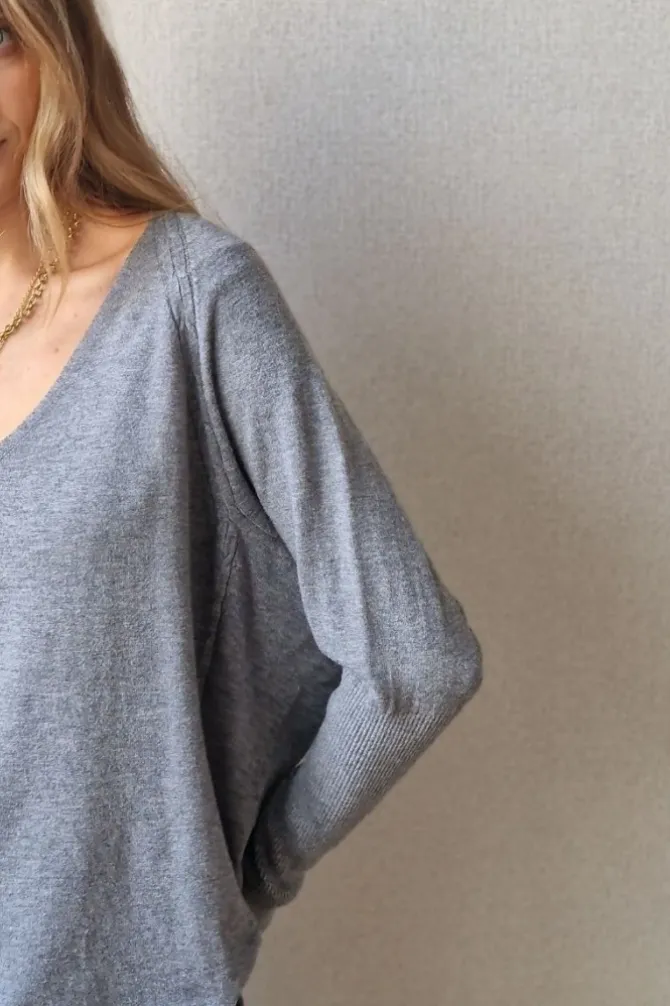 Jersey cuello pico con trenza oversize gris