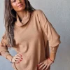 Jersey de cuello cisne punto frio camel