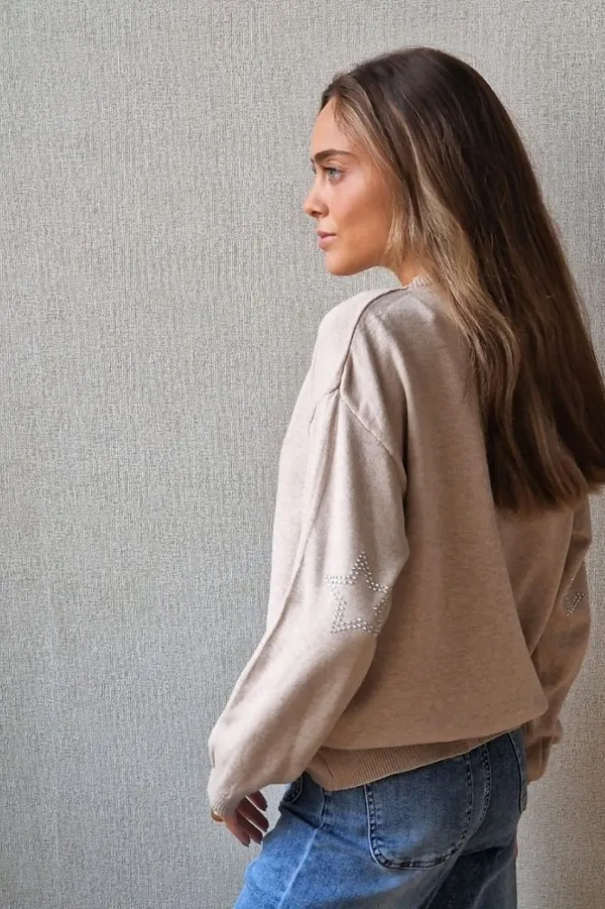 Jersey de mujer con codera de estrellas beige