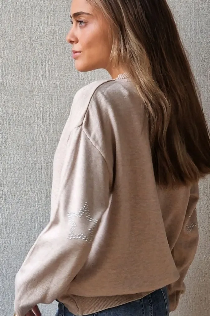 Jersey de mujer con codera de estrellas beige