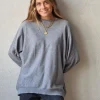 Jersey oversize manga murciélago gris