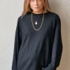 Jersey oversize manga murciélago negro