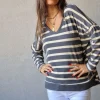 Jersey rayas doradas de punto fino gris