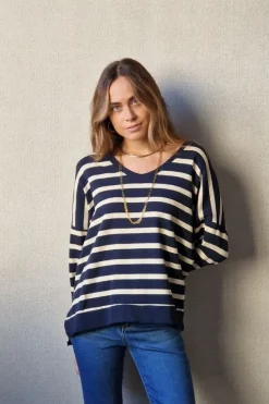 Jersey rayas doradas de punto fino azul marino