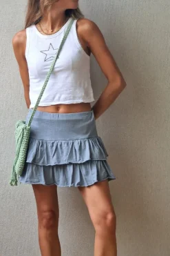 Minifalda pantalón azul con cintura de goma y volantes