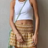 Minifalda pantalón ikat mostaza y blanca