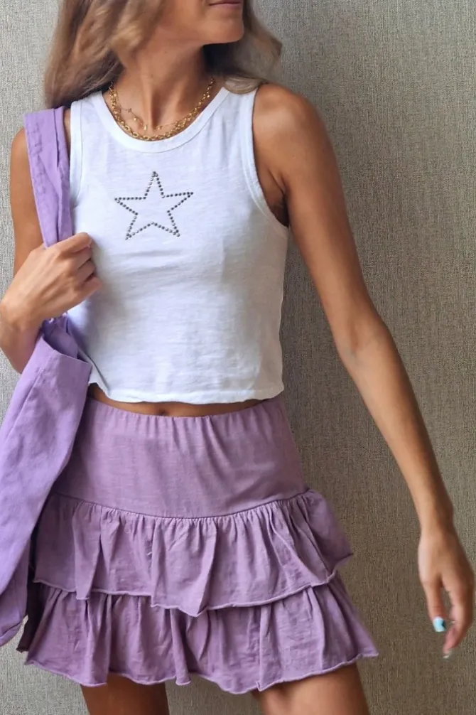 Minifalda pantalón lila con cintura de goma y volantes