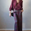 Pantalón de cuadros gris y berenjena