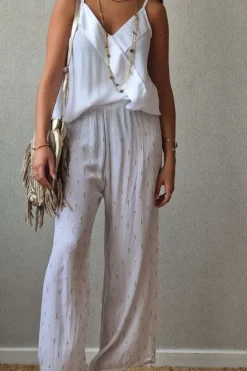 Pantalón tipo bambula blanco y lurex dorado