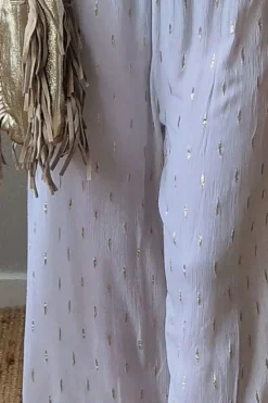 Pantalón tipo bambula blanco y lurex dorado