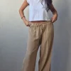 Pantalón tipo lino flecos camel