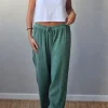 Pantalón tipo lino flecos verde césped