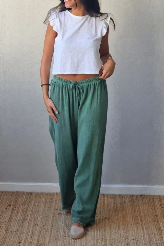 Pantalón tipo lino flecos verde césped