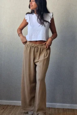 Pantalón tipo lino flecos camel