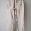 Pantalón vaquero con bolsillos delante beige