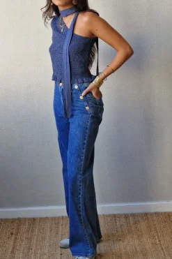 Pantalón vaquero tiro alto con botones