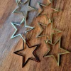 Pendiente acero estrellas dorada