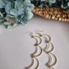 Pendiente acero lunas dorada