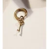 Pendiente combinable de acero aro con llave dorada