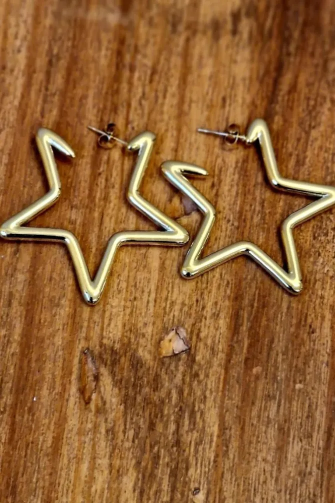 Pendiente estrella acero dorados