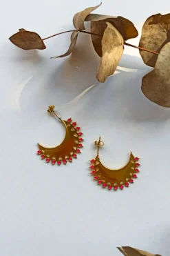 Pendientes dorados de acero inoxidable con detalles en rosa
