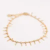 PULSERA ACERO DORADO EN LAGRIMAS