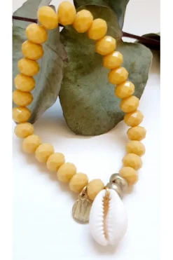 Pulsera ajustable con piedras y conchas amarilla