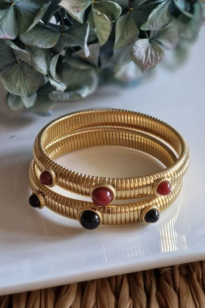 Pulsera de acero ancha con piedras negras