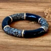 Pulsera piedras y resina negra