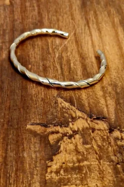 Pulseras rígida de acero cruzada