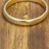 Pulseras rígida de acero dorada