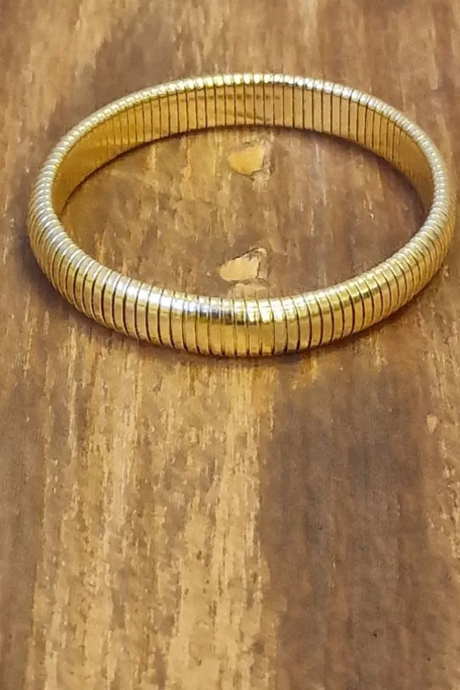 Pulseras rígida de acero dorada