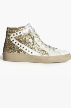 Sneakers doradas con detalles de tachuelas y glitter
