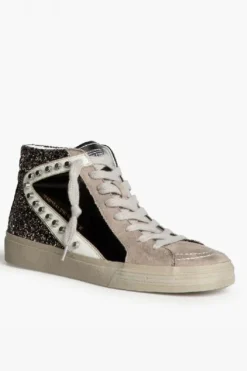 Sneakers negras con detalle blanco, glitter y tachuelas