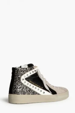 Sneakers negras con detalle blanco, glitter y tachuelas