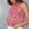 Top flores cuello halter fresa