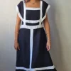 Vestido largo bicolor con volante en negro y blanco