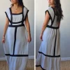 Vestido largo bicolor con volante en gris perla y negro