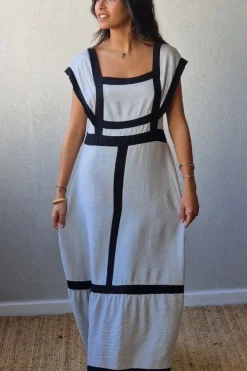 Vestido largo bicolor con volante en gris perla y negro