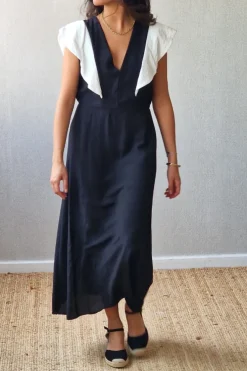Vestido largo bicolor con volante grande en negro y blanco