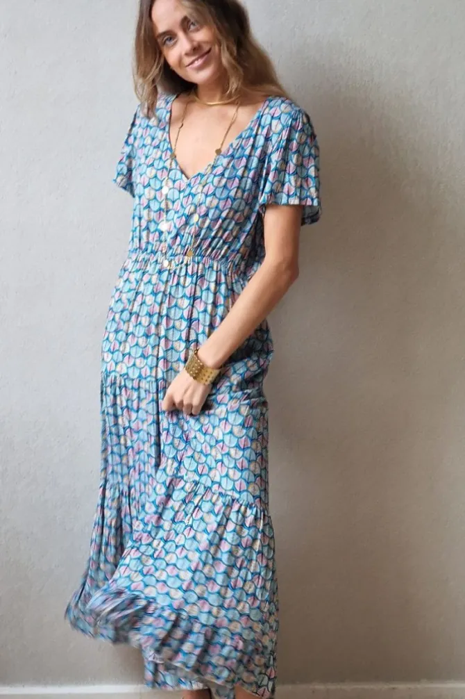 Vestido largo con pico y volantes estampado azul